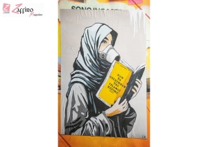 Nuova opera della Street Artist Laika, dal titolo &quot;Poisoned by the Islamic Regime&quot;.